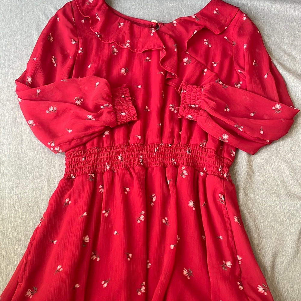 red ruffly flowy floral dress